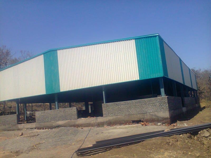 Warehouse with roof and wall cladding sheets installed