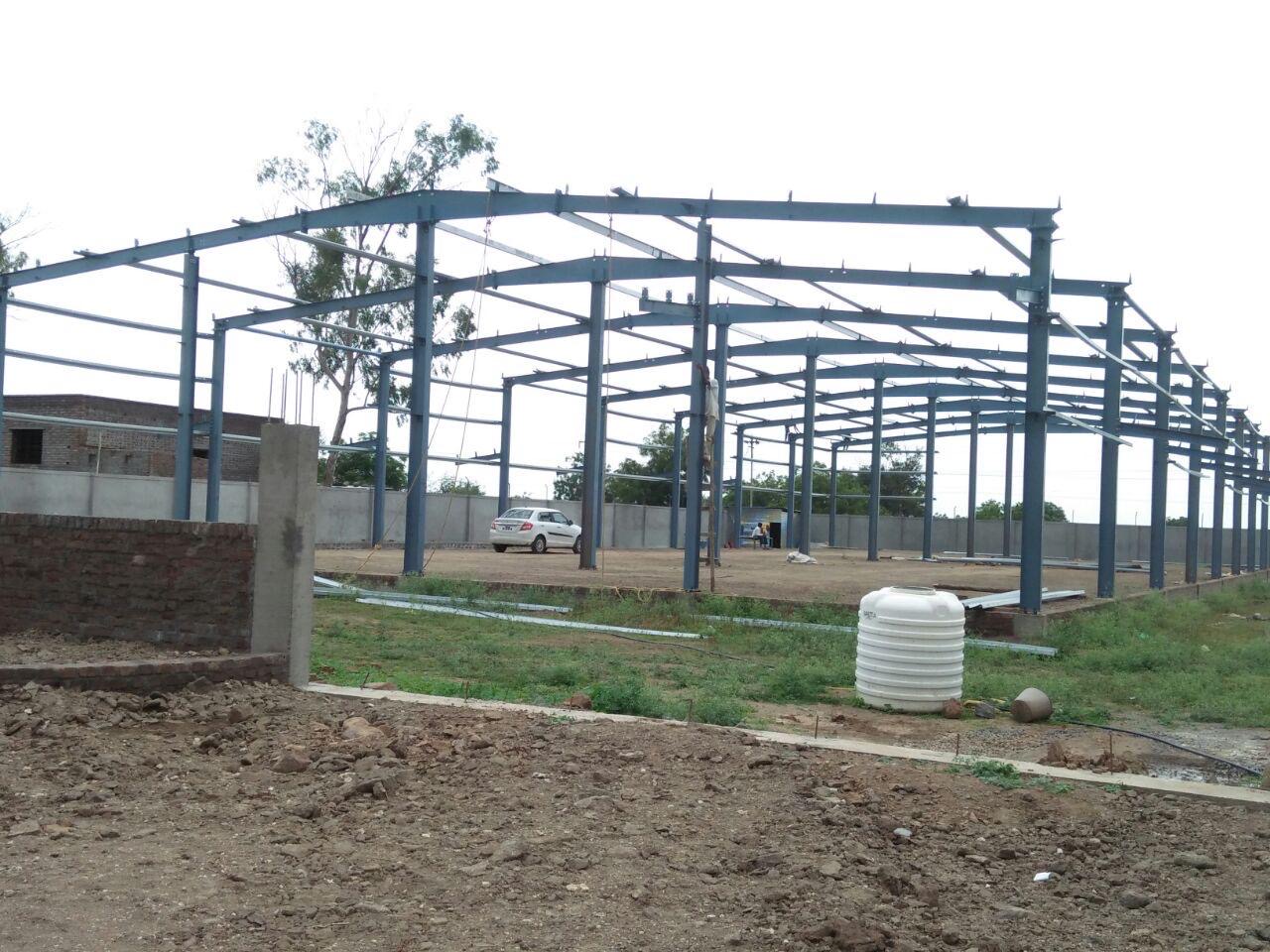 Completed steel frame with roof purlins and bracing, ready for cladding