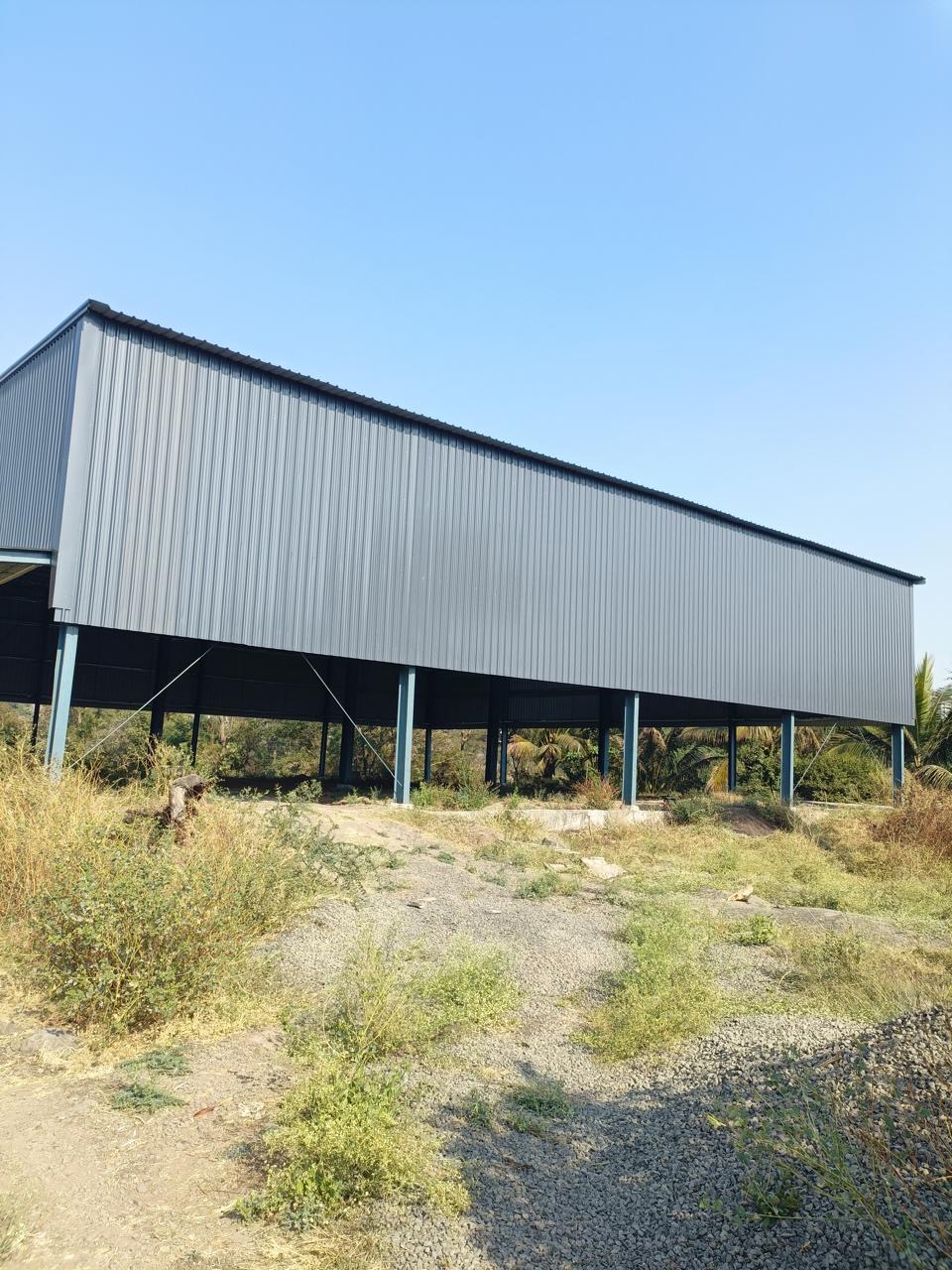 Completed standalone industrial shed in a rural setting