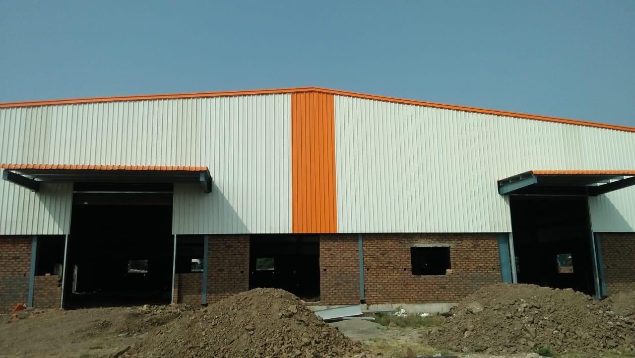 Completed built-to-suit warehouse facility with loading dock doors